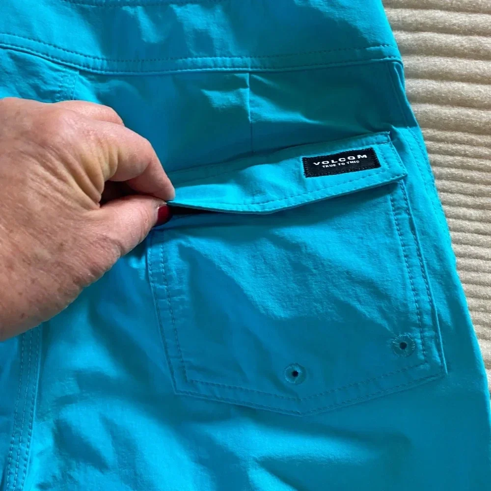 Volcom Boys Board Shorts Swim Suit Pockets Solid Blue size 20 NEW